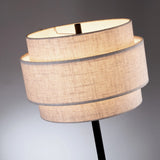 Deena Black Metal Floor Lamp with Retro Tiered White Linen Drum Shade