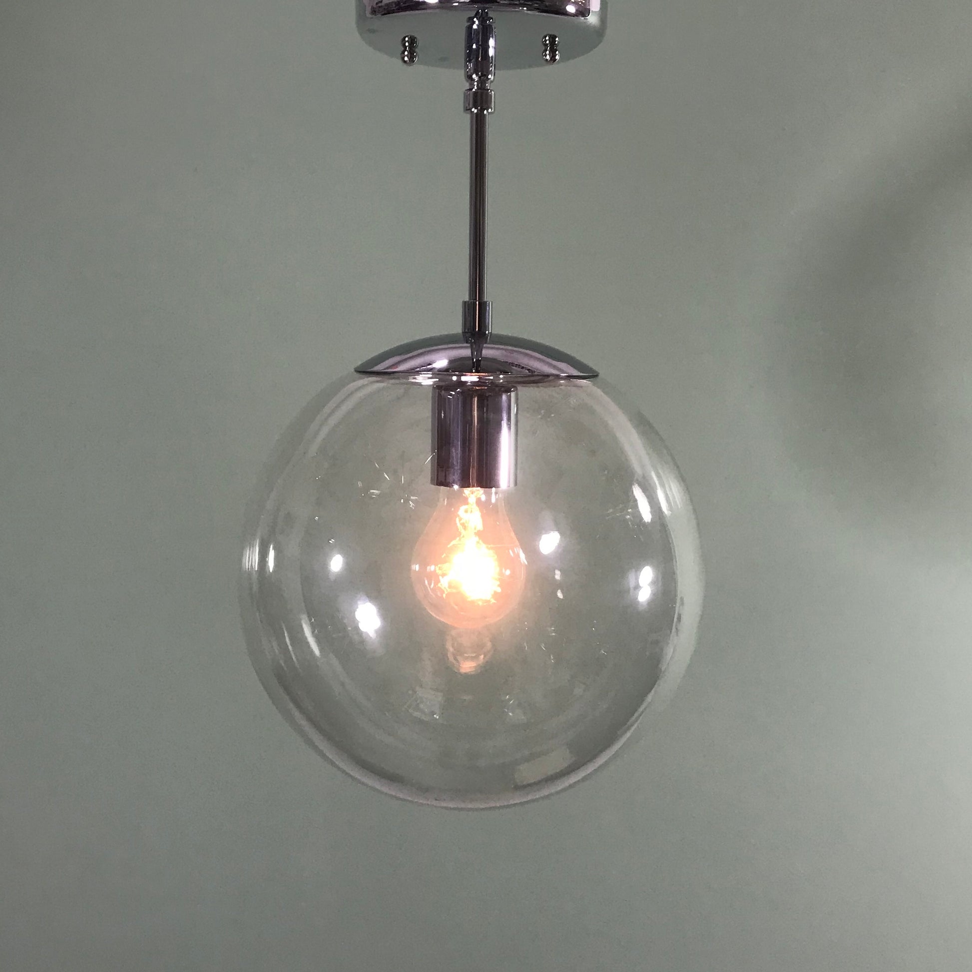 Mid Century Modern 10" Clear Glass Globe Pendant in Polished Chrome