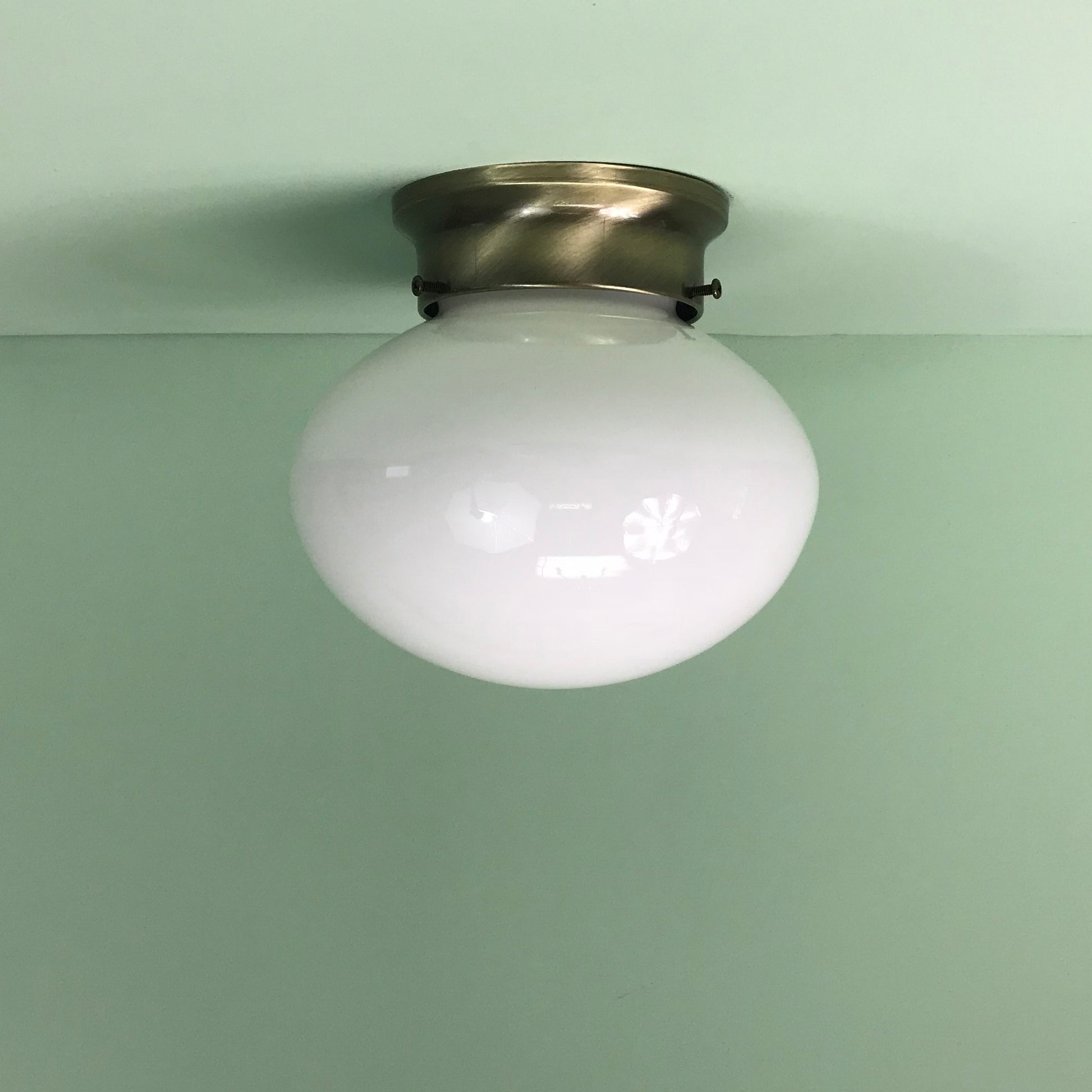 Retro Oval Glass Flush Mount Fixture with Antique Brass Hardware